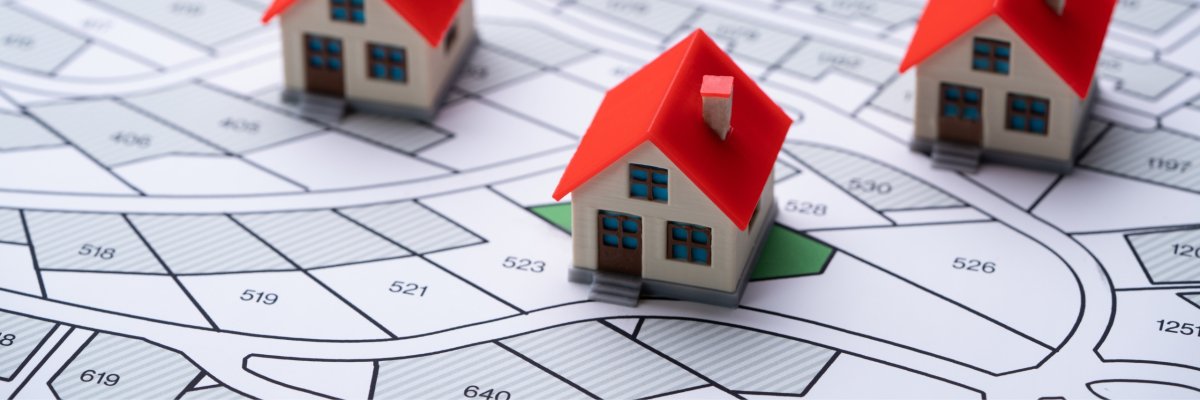 Grundstücksplan und Modellhäuschen